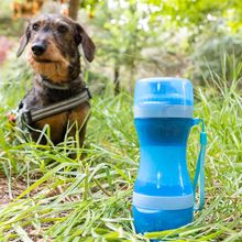 Botella con depósito de agua y comida para mascotas