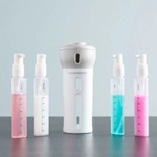 Dispensador de liquidos para viaje 4 en 1