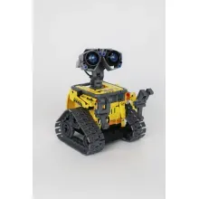 Im juego de bloques de robot dino