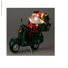 Santa en scooter c/led 25cm surtx2